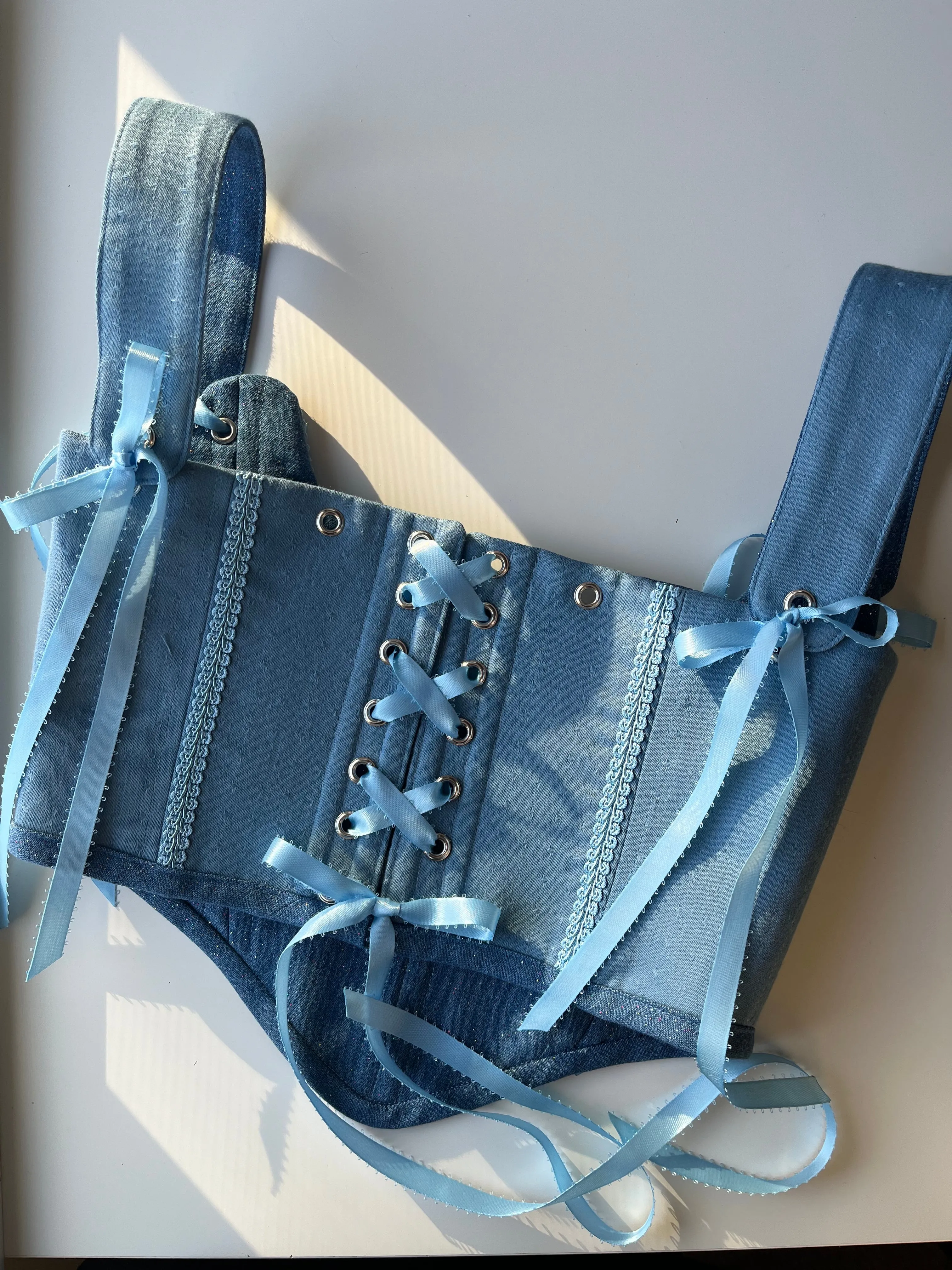 Size S-M Reversible corset in sparkly denim on one side and blue with trim on the other 🩵